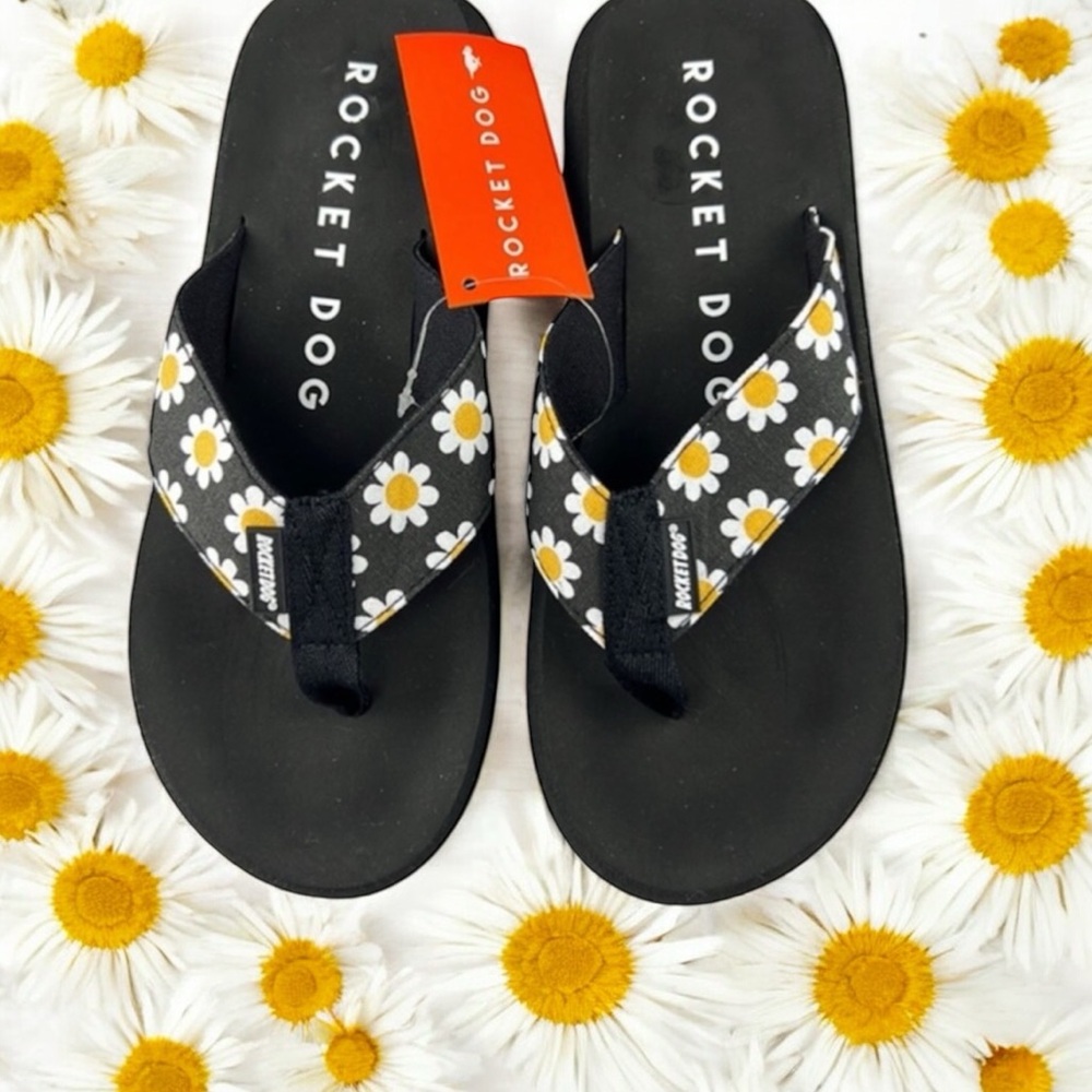 Rocket Dog, ‘Daisy’ flip flops. SZ: Various. NWT